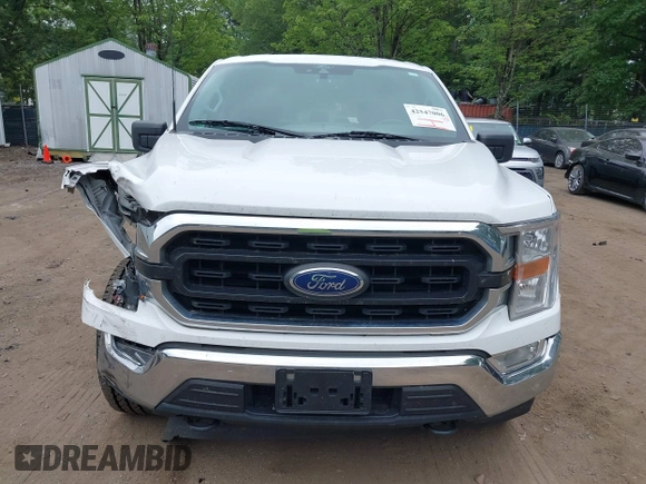 2021 Ford F-150 XL with VIN 1FTFW1ED3MFC37398, listed as a IAAI auction lot 42547006 with 194,971 mi miles and . Bid and sale history available at DreamBid. Image 12.