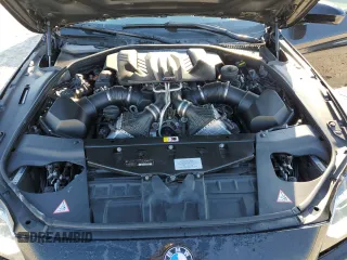 2015 BMW M6 z VIN WBS6C9C5XFD467952, wystawiony jako Copart lot #46312895 z przebiegiem 79 807 mil mil oraz Szkoda całkowita • Salvage title. Historia ofert i sprzedaży dostępna na DreamBid. Obrazek 11.