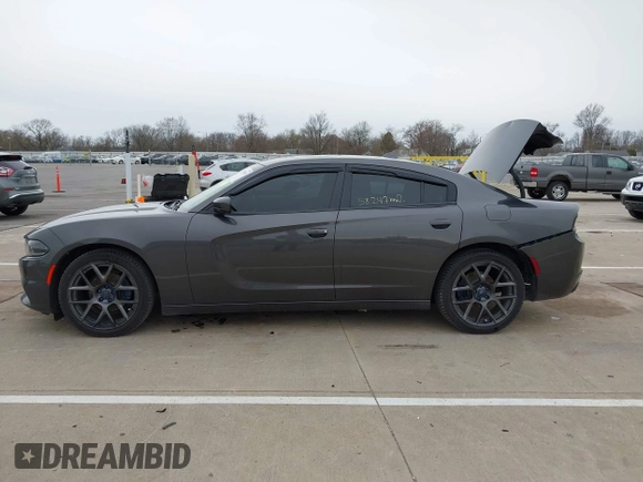 2018 Dodge Charger SXT Plus with VIN 2C3CDXHG0JH217495, listed as a IAAI auction lot 41998783 with 58,247 mi miles and . Bid and sale history available at carsss.com. Image 14.