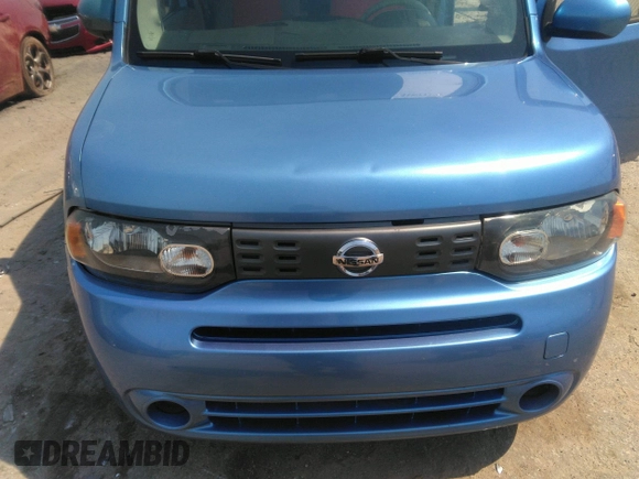 2013 Nissan Cube SL z VIN JN8AZ2KR3DT303672, wystawiony jako IAAI lot #41899753 z przebiegiem 117 840 mil mil oraz . Historia ofert i sprzedaży dostępna na DreamBid. Obrazek 6.