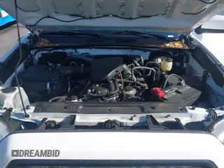 2021 Toyota Tacoma SR with VIN 3TYRX5GN4MT009048, listed as a IAAI auction lot 42291313 with 26,197 mi miles and . Bid and sale history available at DreamBid. Image 10.
