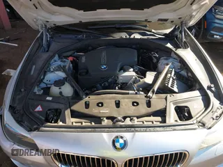 2013 BMW 5 Series 528i with VIN WBAXG5C56DDY36275, listed as a IAAI auction lot 41881102 with 104,022 mi miles and . Bid and sale history available at carsss.com. Image 10.