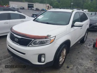 2014 Kia Sorento LX with VIN 5XYKT4A70EG489682, listed as a IAAI auction lot 42088723 with 180,471 mi miles and . Bid and sale history available at carsss.com. Image 2.