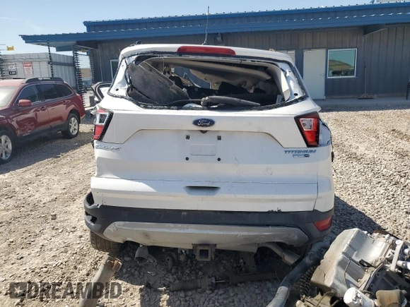 2019 Ford Escape Titanium с VIN 1FMCU9J93KUB60965, выставлен на аукционе Copart как лот 58363185 с пробегом Не указан миль и Списание • Salvage title. История ставок и продаж доступна на DreamBid. Изображение 6.