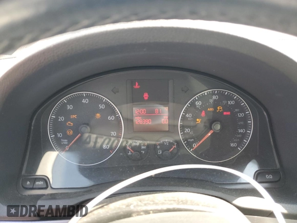 2009 Volkswagen Jetta SE with VIN 3VWRZ71K69M177746, listed as a Copart auction lot 70990074 with 128,390 mi miles and Salvage title. Bid and sale history available at DreamBid. Image 9.