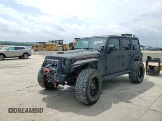 2021 Jeep Wrangler Unlimited Rubicon with VIN 1C4HJXFG5MW542260, listed as a Copart auction lot 59476655 with 19,870 mi miles and Salvage title. Bid and sale history available at DreamBid. Image 14.
