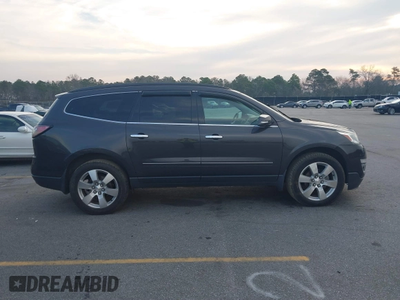 2015 Chevrolet Traverse LTZ with VIN 1GNKVJKDXFJ206159, listed as a IAAI auction lot 41762515 with 143,062 mi miles and . Bid and sale history available at DreamBid. Image 13.