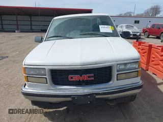 1995 GMC Sierra 1500 z VIN 2GTEK19K0S1580688, wystawiony jako IAAI lot #41811015 z przebiegiem 143 260 mil mil oraz . Historia ofert i sprzedaży dostępna na DreamBid. Obrazek 12.