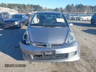 2007 Honda Fit Sport with VIN JHMGD37627S041628, listed as a IAAI auction lot 41102156 with 258,360 mi miles. Bid and sale history available at carsss.com. Image 12.