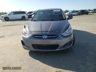 2015 Hyundai Accent GLS with VIN KMHCT4AEXFU884256, listed as a Copart auction lot 52094315 with 146,607 mi miles and Salvage Title. Bid and sale history available at carsss.com. Image 10.