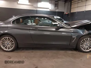 2014 BMW 4 Series 428i xDrive with VIN WBA3T1C59EPS98299, listed as a IAAI auction lot 41741235 with 93,000 mi miles and . Bid and sale history available at carsss.com. Image 13.