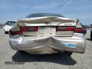 1999 Toyota Camry LE с VIN JT2BG22K6X0369818, выставлен на аукционе Copart как лот 54369385 с пробегом 246 320 миль миль и Списание • Salvage title. История ставок и продаж доступна на DreamBid. Изображение 6.