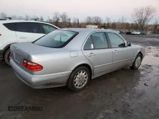 2002 Mercedes-Benz E-Class with VIN WDBJF82J32X066803, listed as a Copart auction lot 85474614 with 77,358 mi miles and Salvage Title. Bid and sale history available at carsss.com. Image 3.