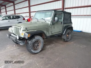 2005 Jeep Wrangler X z VIN 1J4FA39S75P310037, wystawiony jako IAAI lot #42186114 z przebiegiem 154 462 mil mil oraz . Historia ofert i sprzedaży dostępna na DreamBid. Obrazek 17.