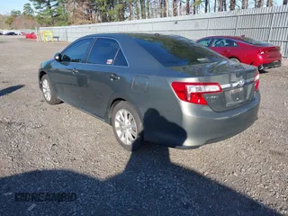 2014 Toyota Camry L with VIN 4T4BF1FK6ER393445, listed as a IAAI auction lot 42044946 with 130,169 mi miles. Bid and sale history available at carsss.com. Image 3.