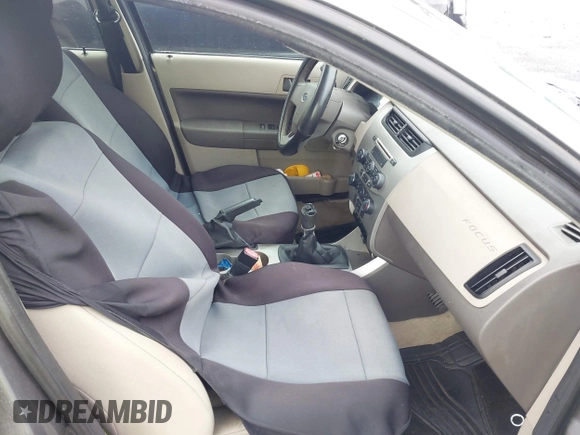 2009 Ford Focus SE z VIN 1FAHP35N59W180533, wystawiony jako IAAI lot #42443367 z przebiegiem 176 065 mil mil oraz . Historia ofert i sprzedaży dostępna na DreamBid. Obrazek 5.