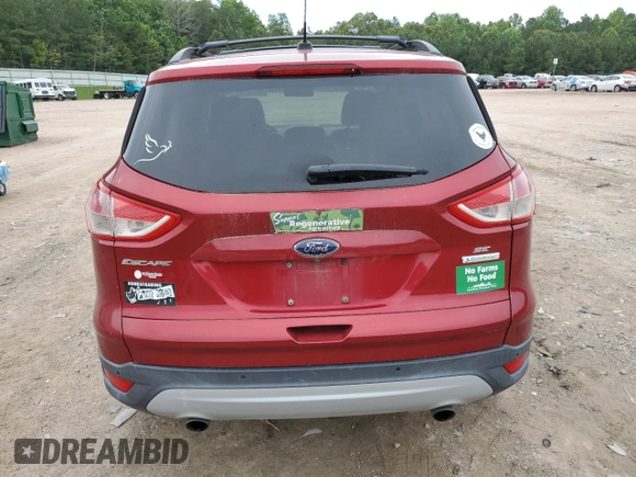 2014 Ford Escape SE с VIN 1FMCU0GX0EUE07865, выставлен на аукционе Copart как лот 59016175 с пробегом 169 537 миль миль и Чистый • Clean title. История ставок и продаж доступна на DreamBid. Изображение 6.
