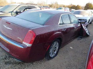 2016 Chrysler 300 with VIN 2C3CCAEG0GH328688, listed as a IAAI auction lot 41340886 with 162,420 mi miles. Bid and sale history available at carsss.com. Image 4.