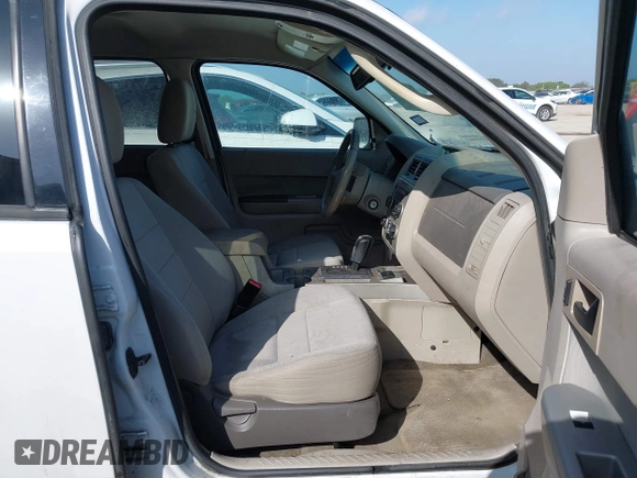 2011 Ford Escape Hybrid with VIN 1FMCU4K3XBKA75758, listed as a IAAI auction lot 42753145 with 170,554 mi miles and . Bid and sale history available at DreamBid. Image 5.
