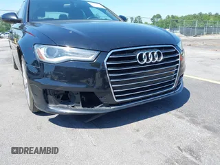 2016 Audi A6 2.0T Premium with VIN WAUCFAFC4GN079394, listed as a IAAI auction lot 42149246 with 145,155 mi miles. Bid and sale history available at carsss.com. Image 6.