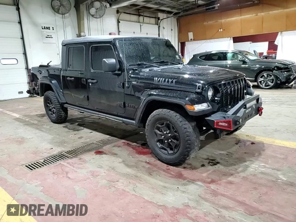 2021 Jeep Gladiator Willys with VIN 1C6HJTAG4ML556255, listed as a Copart auction lot 57143125 with 57,104 mi miles and Salvage title. Bid and sale history available at DreamBid. Image 13.