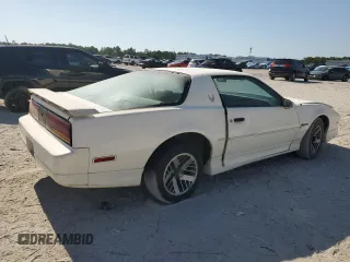 1989 Pontiac Firebird z VIN 1G2FS21S4KL260438, wystawiony jako Copart lot #57420155 z przebiegiem 132 101 mil mil oraz Czysty tytuł • Clean title. Historia ofert i sprzedaży dostępna na DreamBid. Obrazek 4.