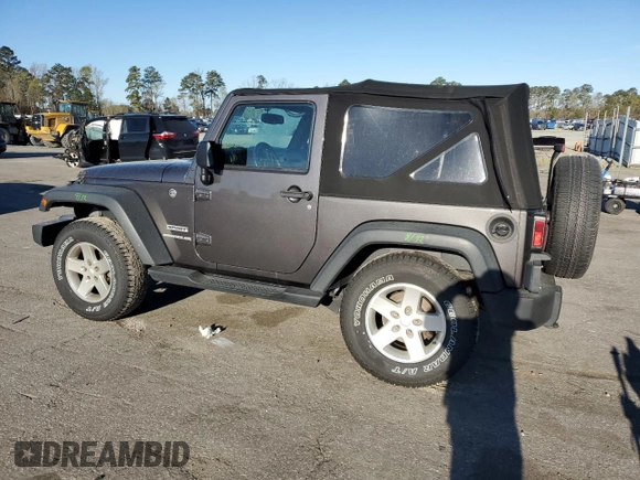 2016 Jeep Wrangler Willys Wheeler with VIN 1C4AJWAG5GL266235, listed as a Copart auction lot 50237195 with 60,830 mi miles and Salvage title. Bid and sale history available at DreamBid. Image 2.