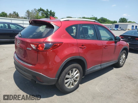 2016 Mazda CX-5 Sport with VIN JM3KE4BY3G0765905, listed as a Copart auction lot 61874165 with 134,546 mi miles and Salvage title. Bid and sale history available at DreamBid. Image 3.