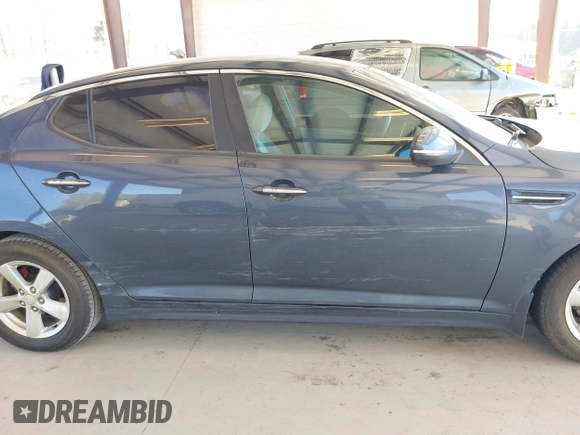 2015 Kia Optima LX with VIN KNAGM4A70F5592109, listed as a IAAI auction lot 42053533 with 159,401 mi miles. Bid and sale history available at carsss.com. Image 6.