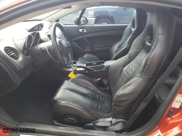 2011 Mitsubishi Eclipse GS with VIN 4A31K5DF2BE001759, listed as a Copart auction lot 79163034 with 104,474 mi miles and Salvage Title. Bid and sale history available at carsss.com. Image 7.