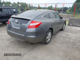 2010 Honda Crosstour EX z VIN 5J6TF1H36AL000580, wystawiony jako IAAI lot #42437917 z przebiegiem 202 259 mil mil oraz . Historia ofert i sprzedaży dostępna na DreamBid. Obrazek 4.