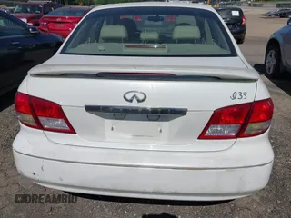 2002 Infiniti I35 Luxury z VIN JNKDA31A72T019247, wystawiony jako IAAI lot #42298446 z przebiegiem 146 787 mil mil oraz . Historia ofert i sprzedaży dostępna na DreamBid. Obrazek 16.