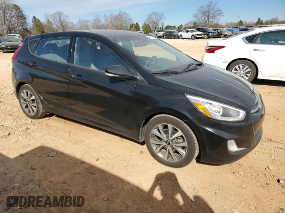 2015 Hyundai Accent Sport with VIN KMHCU5AE9FU233087, listed as a Copart auction lot 43356795 with 107,140 mi miles and Clean Title. Bid and sale history available at carsss.com. Image 4.
