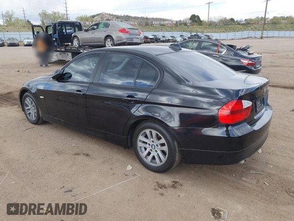 2007 BMW 3 Series 328i with VIN WBAVA33517KX74605, listed as a Copart auction lot 54376065 with 128,773 mi miles and Salvage Title. Bid and sale history available at DreamBid. Image 2.