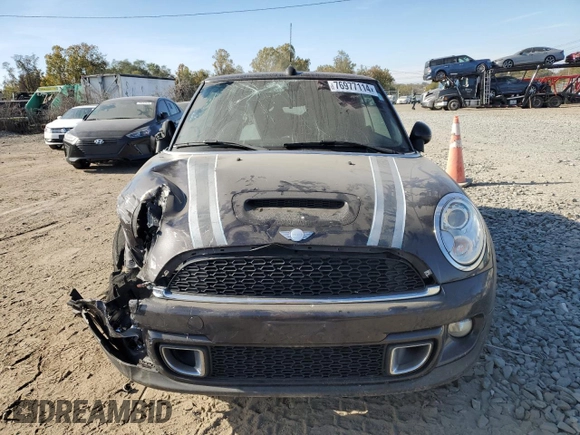 2014 MINI Convertible S with VIN WMWZP3C55ET298172, listed as a Copart auction lot 76977114 with 119,138 mi miles and Salvage title. Bid and sale history available at DreamBid. Image 5.