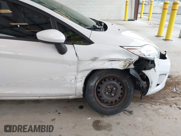 2013 Ford Fiesta S with VIN 3FADP4TJ4DM226897, listed as a IAAI auction lot 41916651 with 56,714 mi miles and . Bid and sale history available at DreamBid. Image 6.