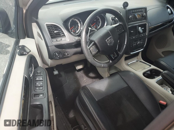 2014 Dodge Grand Caravan SXT 30th Anniversary with VIN 2C4RDGCG2ER328126, listed as a Copart auction lot 74277684 with Not Provided miles and Salvage Title. Bid and sale history available at DreamBid. Image 8.