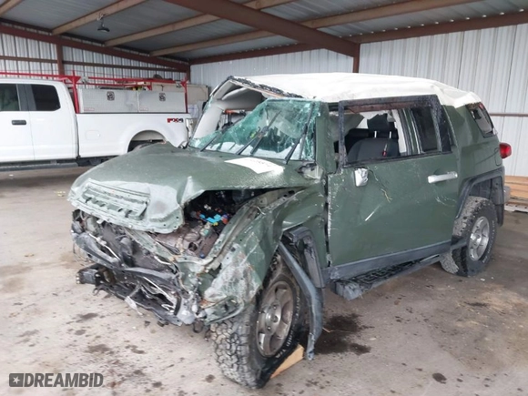 2010 Toyota FJ Cruiser with VIN JTEBU4BF7AK094594, listed as a IAAI auction lot 41425514 with 253,814 mi miles. Bid and sale history available at carsss.com. Image 6.