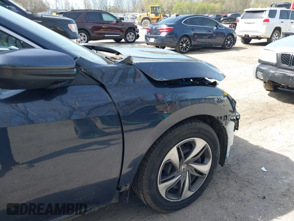 2021 Honda Civic LX z VIN 19XFC2F65ME000324, wystawiony jako IAAI lot #42137375 z przebiegiem 78 473 mil mil oraz . Historia ofert i sprzedaży dostępna na DreamBid. Obrazek 19.