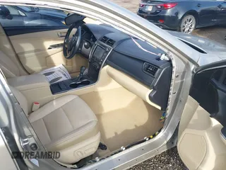 2017 Toyota Camry Hybrid LE with VIN 4T1BD1FK9HU214495, listed as a IAAI auction lot 41953655 with 106,409 mi miles. Bid and sale history available at carsss.com. Image 5.