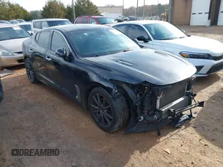2018 Kia Stinger with VIN KNAE15LA9J6013202, listed as a IAAI auction lot 41123581 with 122,194 mi miles. Bid and sale history available at carsss.com. Image 1.