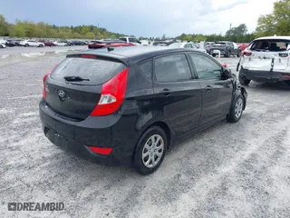 2014 Hyundai Accent GS with VIN KMHCT5AE7EU164658, listed as a IAAI auction lot 41911092 with 132,442 mi miles. Bid and sale history available at carsss.com. Image 4.