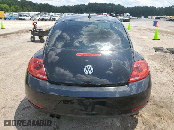 2015 Volkswagen Beetle Fleet Edition with VIN 3VWF17ATXFM645590, listed as a Copart auction lot 58234745 with 128,469 mi miles and Salvage title. Bid and sale history available at DreamBid. Image 6.