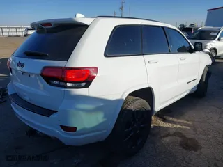 2021 Jeep Grand Cherokee Laredo X with VIN 1C4RJEAG6MC658195, listed as a IAAI auction lot 41414668 with 52,488 mi miles. Bid and sale history available at carsss.com. Image 4.