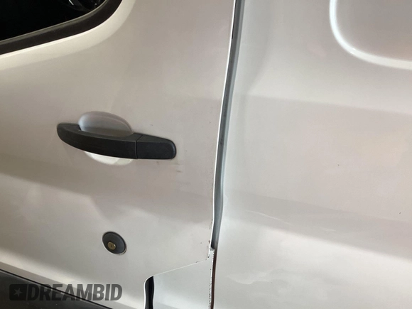2015 Ford Transit Cargo with VIN 1FTNR1ZM1FKA44965, listed as a IAAI auction lot 42679340 with 151,641 mi miles and . Bid and sale history available at DreamBid. Image 28.