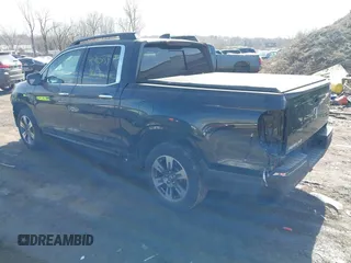 2019 Honda Ridgeline RTL-E with VIN 5FPYK3F7XKB014406, listed as a IAAI auction lot 41765154 with 65,209 mi miles and . Bid and sale history available at DreamBid. Image 3.