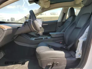 2023 Tesla Model 3 with VIN 5YJ3E1EA7PF488316, listed as a Copart auction lot 49655325 with 60,589 mi miles and Salvage Title. Bid and sale history available at DreamBid. Image 7.