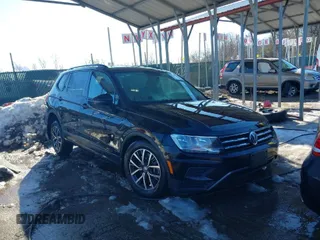2021 Volkswagen Tiguan S with VIN 3VV0B7AXXMM118642, listed as a IAAI auction lot 41265544 with 35,410 mi miles. Bid and sale history available at carsss.com. Image 1.