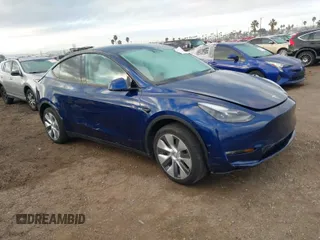 2023 Tesla Model Y Long Range with VIN 7SAYGDEE6PF947827, listed as a IAAI auction lot 41443524 with 12,381 mi miles and . Bid and sale history available at DreamBid. Image 1.