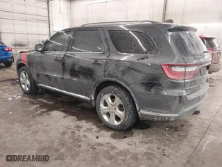 2014 Dodge Durango Limited with VIN 1C4RDJDG5EC977844, listed as a IAAI auction lot 41558932 with 133,703 mi miles. Bid and sale history available at carsss.com. Image 3.
